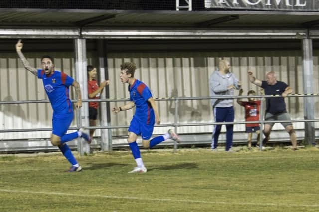 Kieran Clark celebrates his injury time winner at Romsey last night. Picture by Ken Walker.