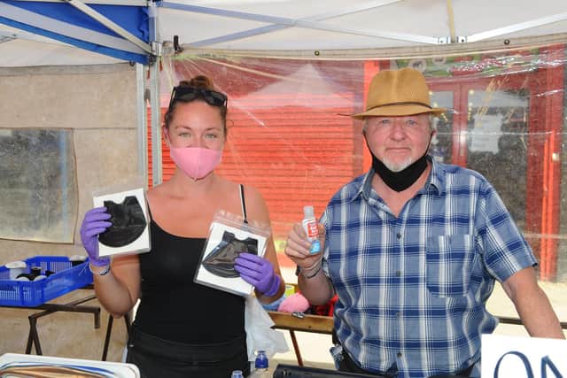 Katherine Hibdige (29) and her father Steve on their stall selling face masks and antibacterial gels.
Picture: Sarah Standing (010620-9249)