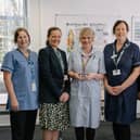 Charmaine Watts has been awarded the Chief Nursing Officer Award. 
Pictured: Charmaine (middle) with her colleagues.