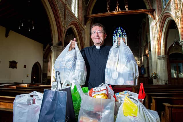 The Rev Paul Armstead with some of the donations at St James' Church in Milton 
Picture: Habibur Rahman