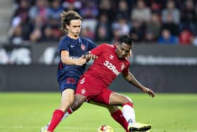 Rasmus Nicolaisen (left) tangles with Rangers' Alfredo Morelos in a Europa League third round qualifying match in August 2019. Picture: HENNING BAGGER/AFP via Getty Images.