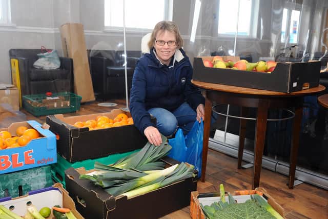 Debra Redpath, community co-ordinator for the 'Feed a Family' scheme, with some of the fruit and vegetables donated by Boxxfresh in Titchfield. Picture: Sarah Standing