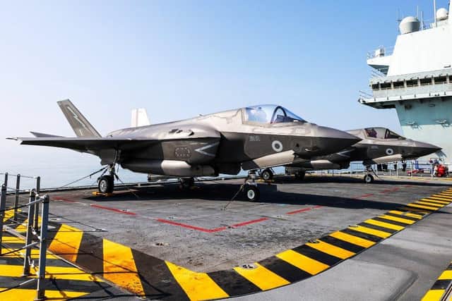Two F-35s pictured being lifted up on to the flight deck of HMS Prince of Wales. Photo: Royal Navy