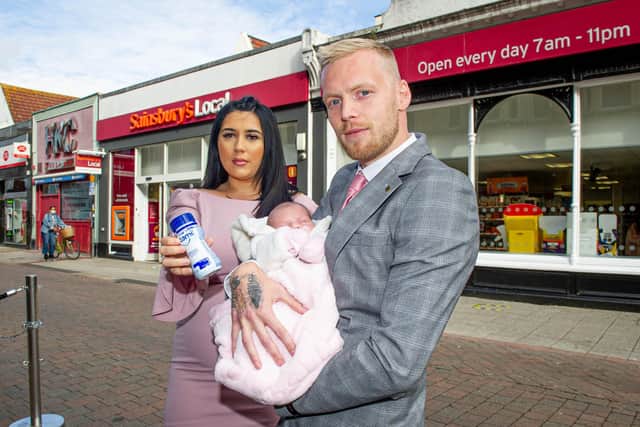 Perry Hore with his partner Georgia Hillier and Meadow-Amaya outside Sainsbury's on Palmerston Road, Southsea
Picture: Habibur Rahman