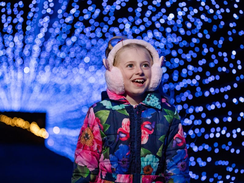 Magical scenes include a tunnel of lights