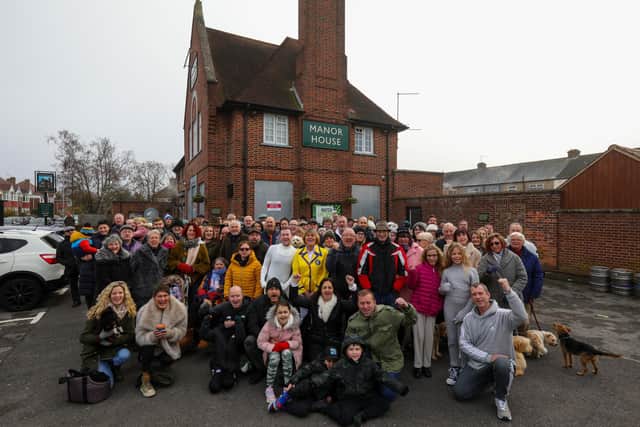 Campaigners outside the Manor House pub, Drayton, where they object to owners Greene King's closure of the community hub.
Picture: Chris Moorhouse