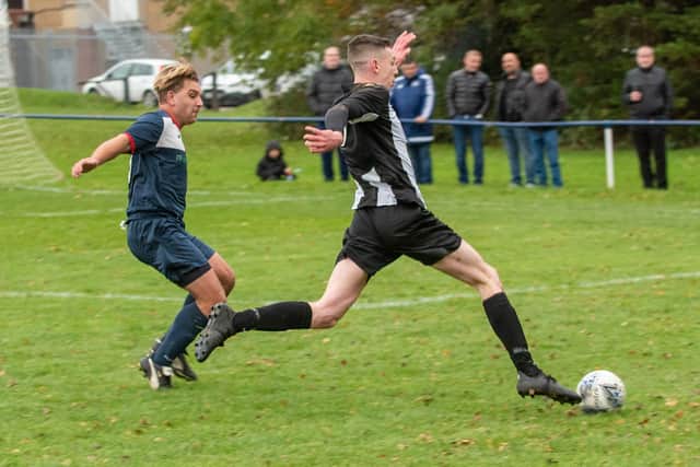 Hayling's George Rough, right, scored in his side's seventh straight HPL win against Clanfield. Picture: Vernon Nash