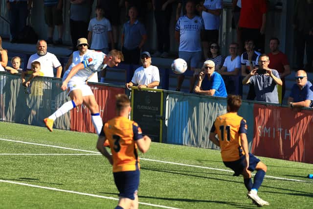 Paul Rooney seals Hawks' 3-1 win against Slough with a far post header. Picture by Dave Haines.
