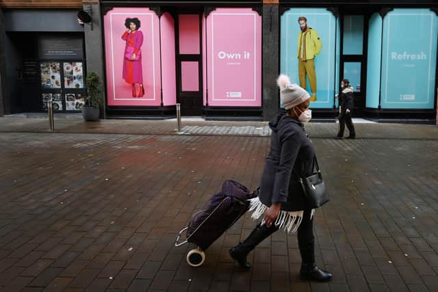 A shopper walks past closed shops as a second lockdown draws closer Picture: Paul Ellis/AFP via Getty Images)