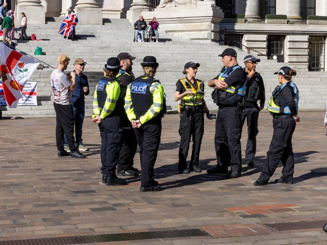 Police occupy the space between the two groups of protestors in Guildhall Square. Picture: Mike Cooter (280924)