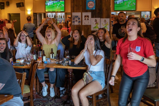 Early excitement in the Westleigh as England come close to a goal in the Women's World Cup. Picture: Mike Cooter (200823)