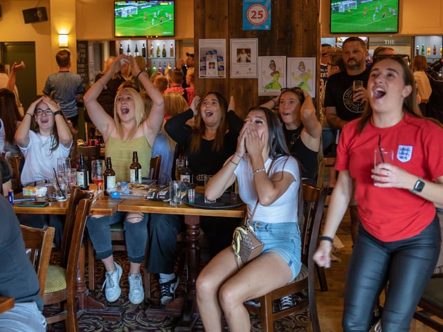 Early excitement in the Westleigh as England come close to a goal in the Women's World Cup. Picture: Mike Cooter (200823)