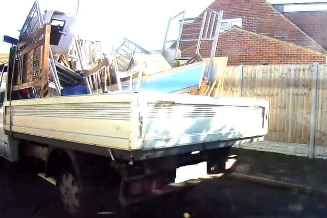 The driver of this waste removal truck decided to unload wood from his truck and leave it piled at the side of the road to make way for a more valuable load in Gosport. Picture: Gosport Borough Council