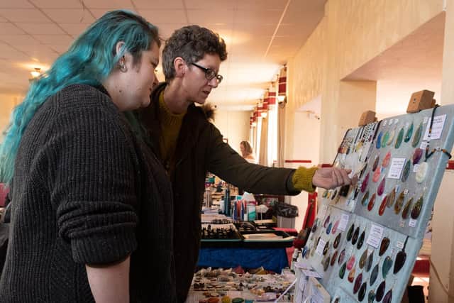 Aurora Delahunty and Deana Balsdon examine some jewellery at a stall. Picture: Keith Woodland (071121-9)