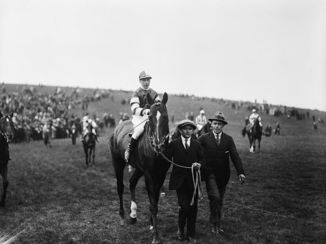 29th July 1919: The winning horse, 'King Sol', being led away after a race at Goodwood. (Photo by Topical Press Agency/Getty Images)