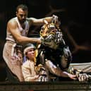 Richard Parker the tiger and puppeteers in Life of Pi. Photo by Johan Persson