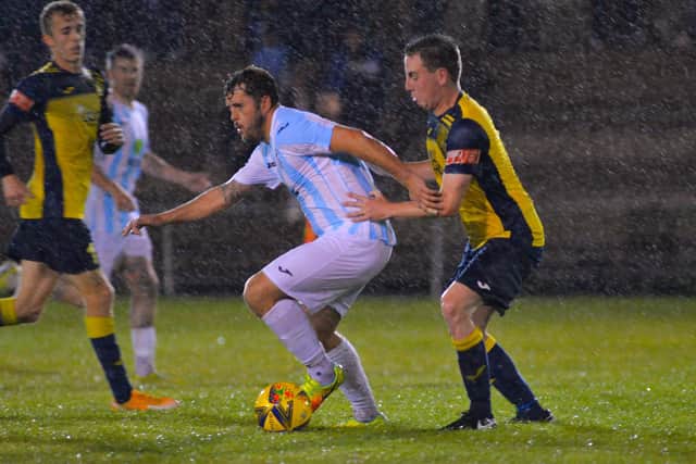 Tom Cain, right, keeps a close eye on Blu Boam. Picture: Martyn White