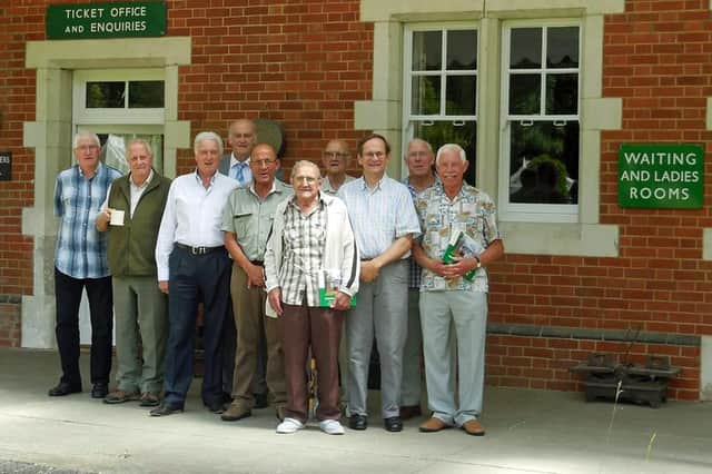 Railwaymen at the old Droxford station. John Hartfree, front, third from the left, with several former drivers who worked the Meon Valley line.