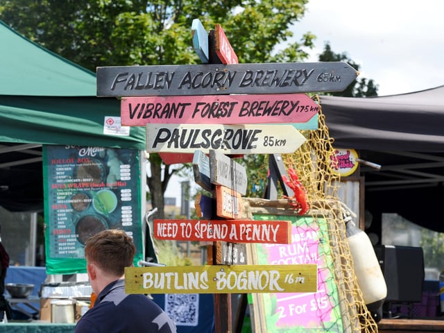 A signpost on display at the Gunwharf Street Food Festival.  Picture: Sarah Standing (010825-1405)