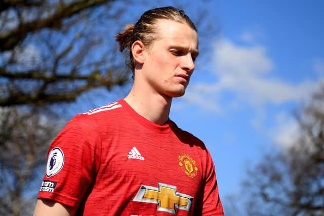 ENFIELD, ENGLAND - MARCH 19:  Max Taylor of Manchester United takes to the field during the Premier League 2 match between Tottenham Hotspur and Manchester United at Tottenham Hotspur Training Centre on March 19, 2021 in Enfield, England. (Photo by Alex Davidson/Getty Images)