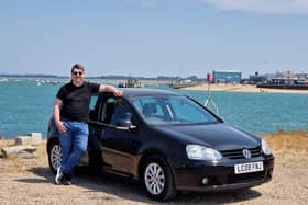 David George stood alongside his car on the Eastney end of the Haying Island ferry. Picture: Habibur Rahman