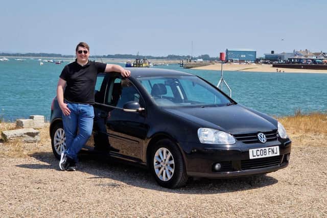 David George stood alongside his car on the Eastney end of the Haying Island ferry. Picture: Habibur Rahman