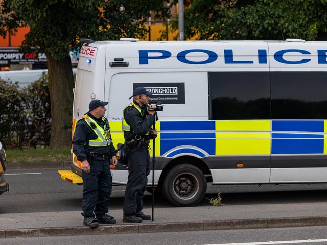 Policing the Anti-immigration protest near the UK Border Agency Building in Portsmouth. Picture: Mike Cooter (070824)