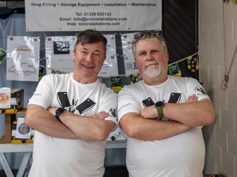 Steve Shaw (39) Dean Child (60) running the cider stall in Wickham. Picture: Mike Cooter (060424)