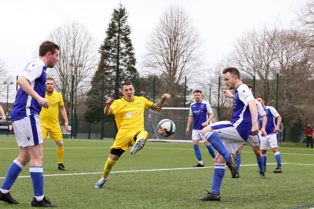 Denmead (blue) v Harvest. Picture: Chris Moorhouse