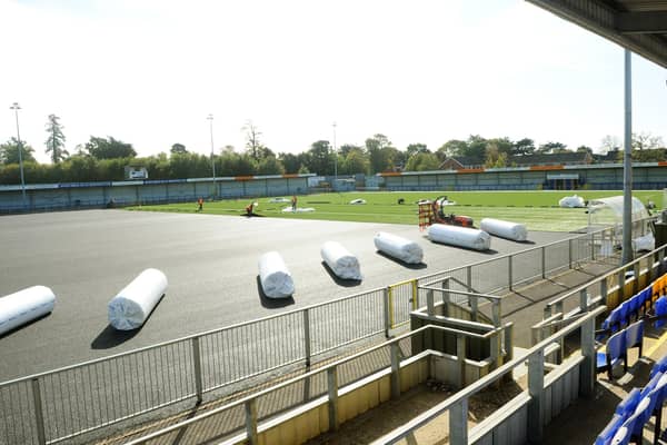As Hawks wait for news of any government financial help, the club's new 3G pitch is being laid ahead of this weekend's FA Cup tie with Horsham at Westleigh Park. Picture: Sarah Standing