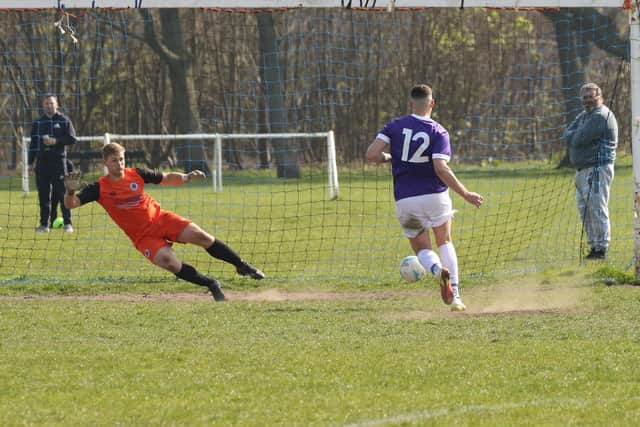 The Meon's James Cowan converts a penalty against Southsea United. Picture by Kevin Shipp