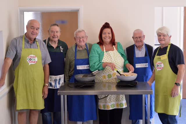 Jayne Gentle, who heads up 'Chop Cook Chat', has been shortlisted for a regional care award. Also pictured are (from left) Philip, Eddie, Ron, Ron, and John from the Hilsea Hub group