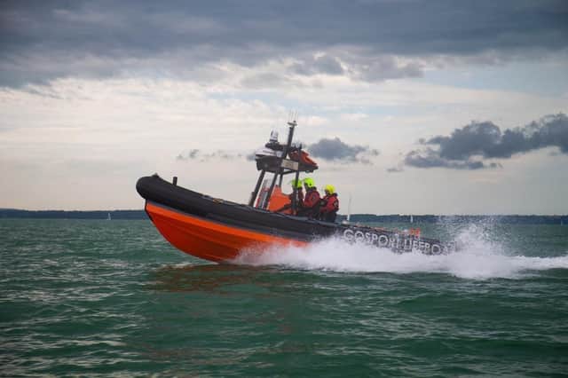 A boat captain was rescued from a grounded yacht in Portsmouth HarbouLifeboat crews rescued a party of seven people including a child after their boat broke down.