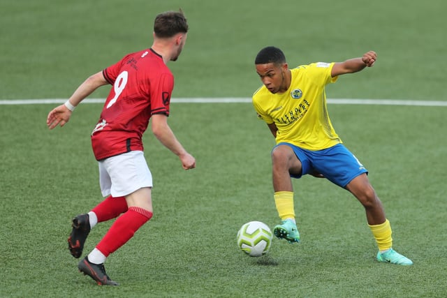 Camberley's two-goal Macauley Martin, left, and Hawks' Leon Baker. Picture: Dave Haines.