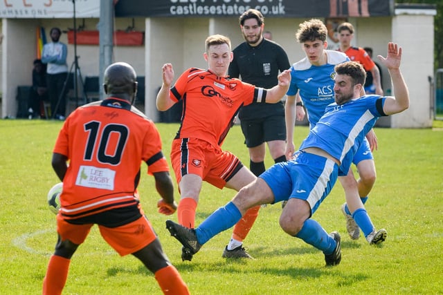 Action from the 2-2 draw between AFC Portchester under-23s (orange and black kit) and Liphook United. Picture: Keith Woodland (150421-827)