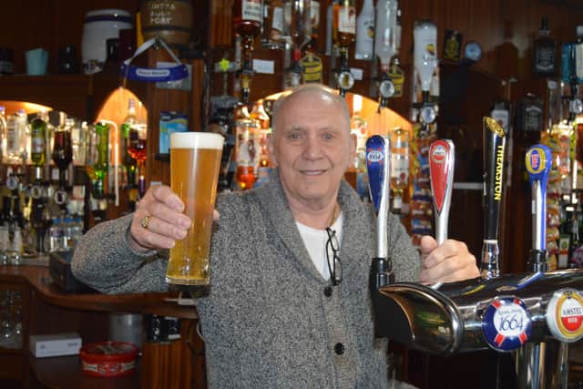 Tony Wingfield pouring a pint at the Raven Pub in Portsmouth. Picture: David George