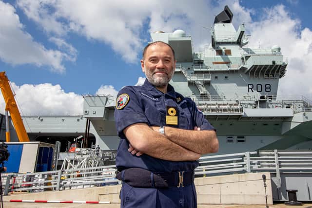 Pictured: Commodore Steve Moorhouse in front of HMS Queen Elizabeth before she set sail from Portsmouth
Picture: Habibur Rahman