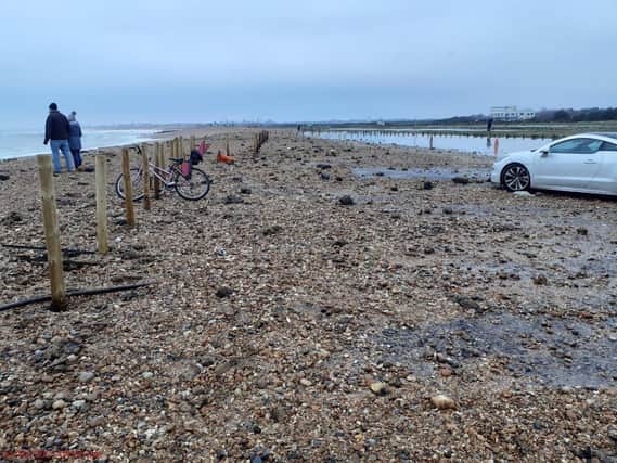 Debris left behind after adverse weather which has caused half of West Beach car park on Hayling Island to remain closed.