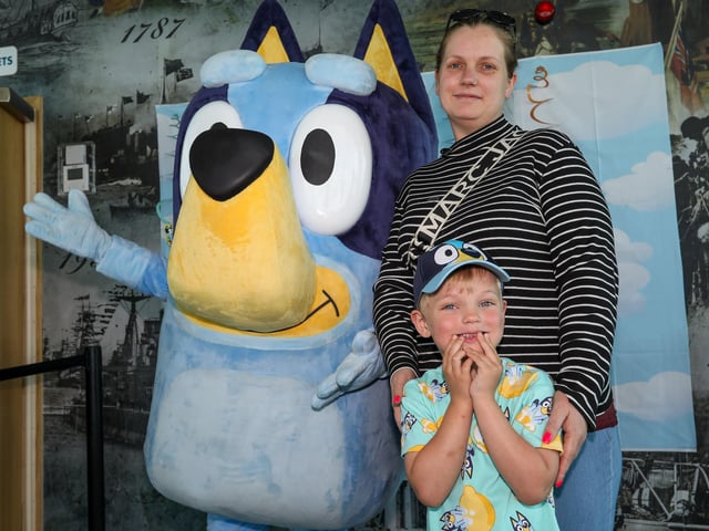 Lyndsey and Jude meet Bluey at the Spinnaker Tower.Picture: Chris Moorhouse (290524-32)