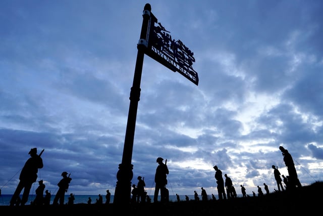 A view of the Standing with Giants silhouettes which create the For Your Tomorrow installation at the British Normandy Memorial, in Ver-Sur-Mer, France, as part of the  80th anniversary of D-Day.
