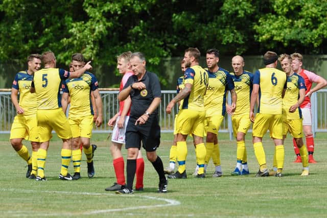 Moneys celebrate a goal during the 8-0 friendly win at Arundel. Picture by Steven Goodger.