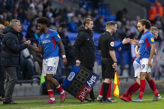 Pompey boss Kenny Jackett substitutes Ellis Harrison and Marcus Harness against Bolton last season. Picture: Daniel Chesterton/phcimages.com