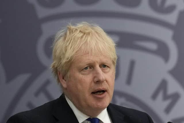 British Prime Minister Boris Johnson delivers a speech to members of the armed services and Maritime and Coastguard Agency at Lydd airport in Kent. Picture date: Thursday April 14, 2022.