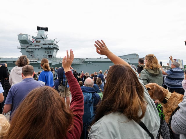Well-wishers and loved ones of crew members welcomed home HMS Prince of Wales - with families gathering on the Round Tower to see them.