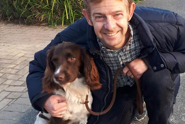 Paul, who is running the London Marathon to raise funds for Hearing Dogs for Deaf People. Paul is pictured with his dog Crowley
