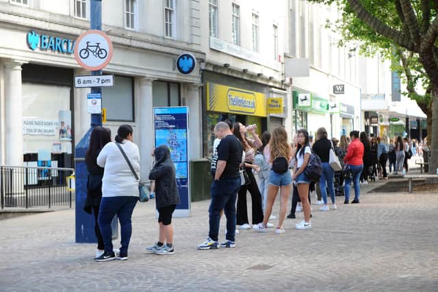 Queueing for Primark in Commercial Road, Portsmouth. Picture: Sarah Standing (150620-9947)