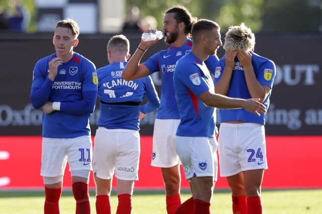 Pompey dejected after last season's play-off semi-final loss at Oxford. Picture: Robin Jones/Getty Images