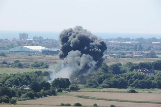 File photo taken with permission from the Twitter feed of @keirstanding of smoke following a crash involving a plane near Shoreham Airshow in West Sussex on the A27 Picture: @keirstanding/PA Wire