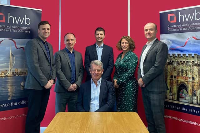 AUDIT STRENGTH. HWB’s registered auditors, standing from left: Directors James Flood and Gary Brown,