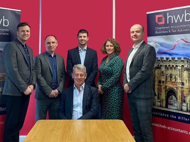 AUDIT STRENGTH. HWB’s registered auditors, standing from left: Directors James Flood and Gary Brown,